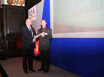 QM&T student receiving Diploma Graduation Award